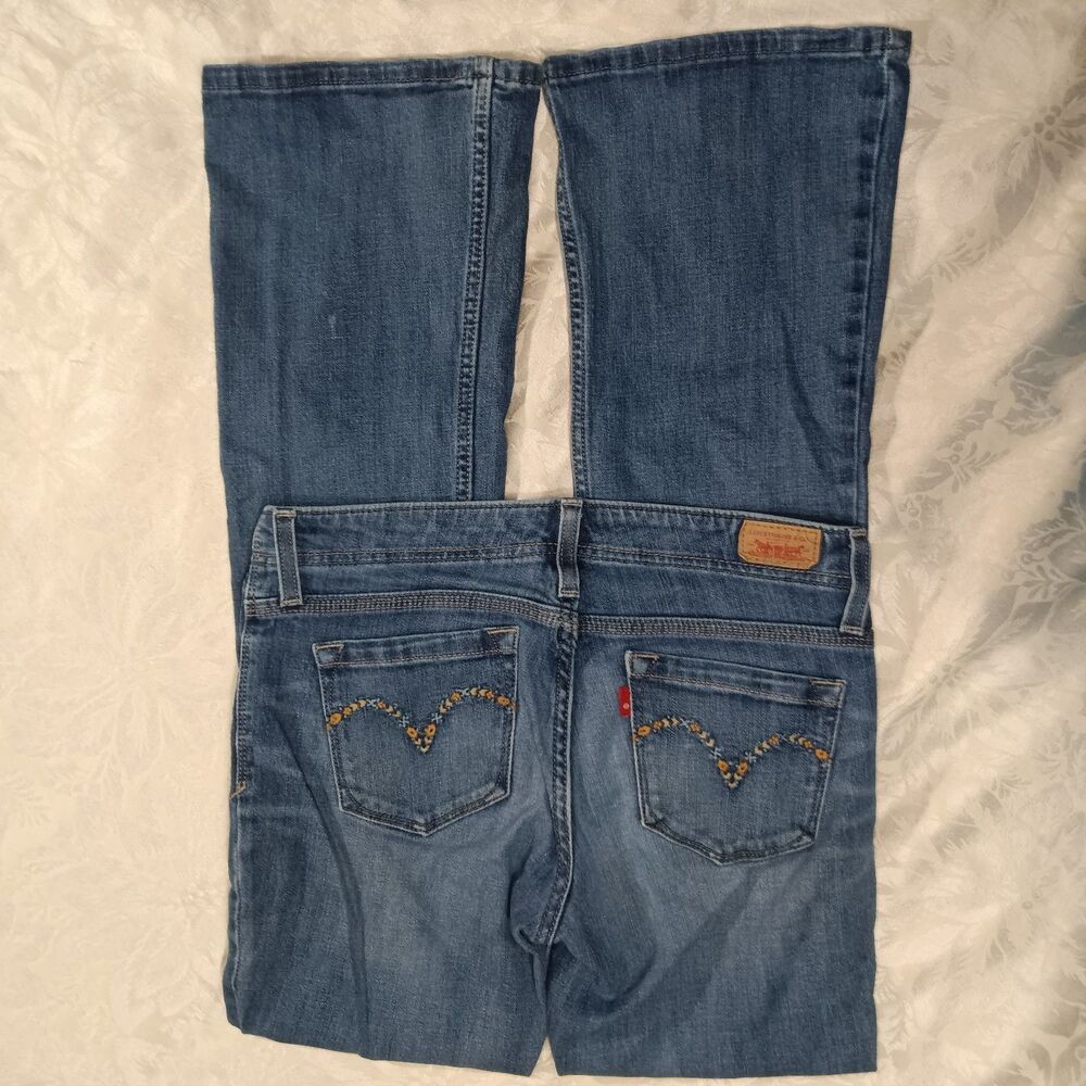 Levis Jeans 7M Medium Wash Floral Embroidered Pockets Lowrise BootFlare Stretchy
